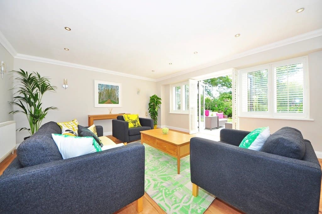 Family living room with plants and garden doors